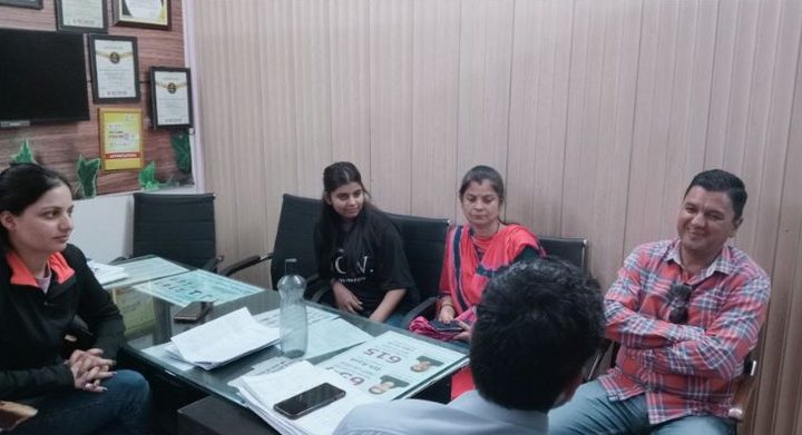 Parents meeting a teacher at Future Forum