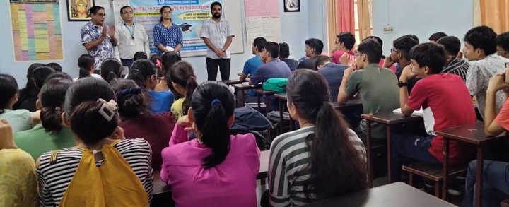 Experts addressing students in a classroom